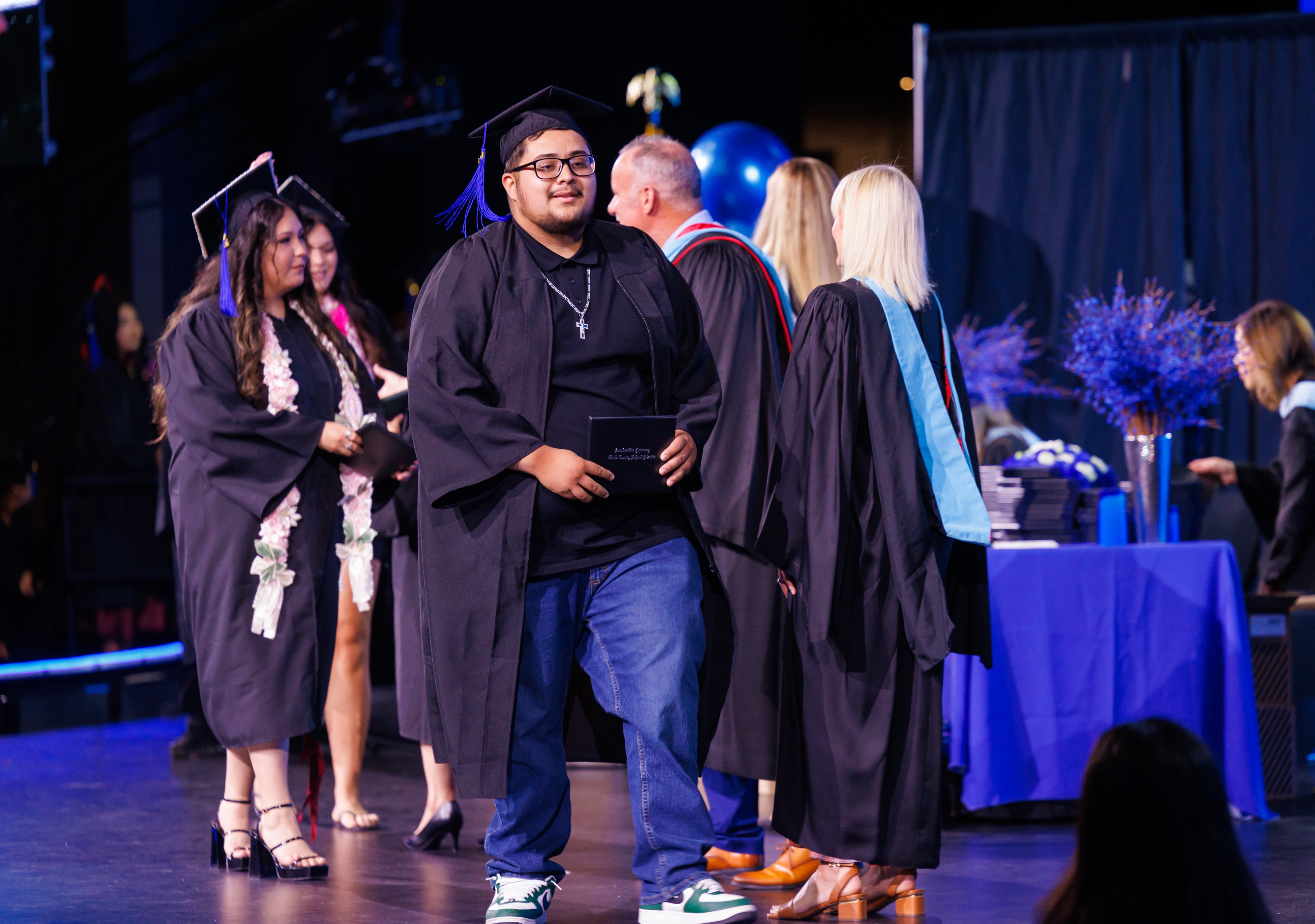 Ernesto receives his high school diploma