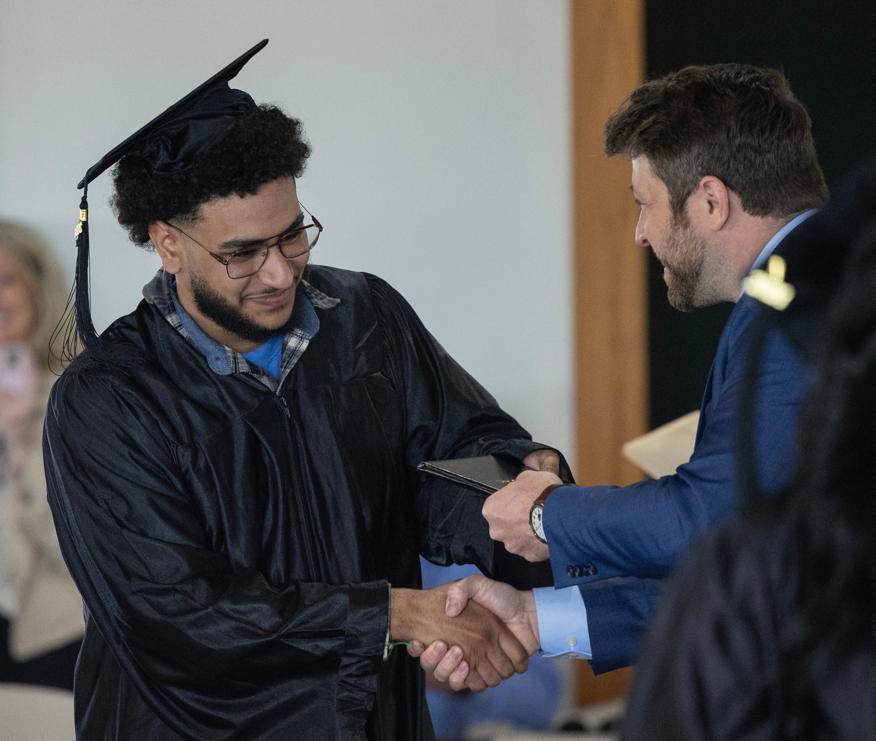 Antonios Michael gets diploma from Chris