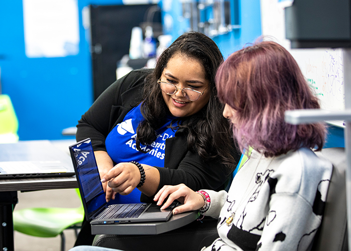 coach-working-along-side-student