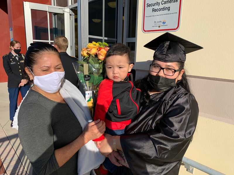 Samantha Mendoza with son and mother at graduation
