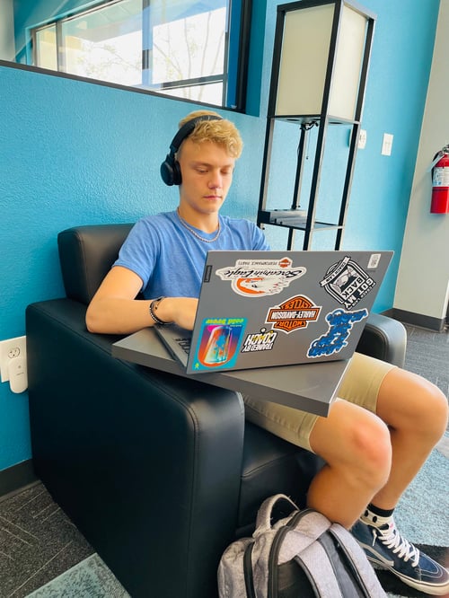 Sean Chupp working on a computer