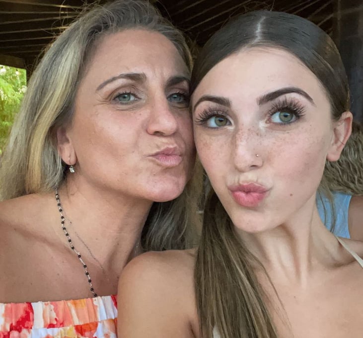 Mom and daughter pose for selfie