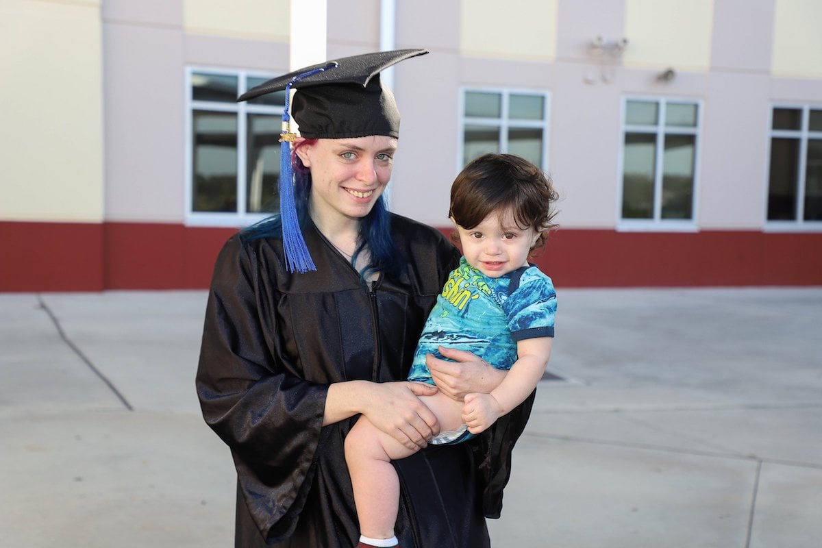 St. Lucie Acceleration Academies Graduate Summer Worthington smiles with baby
